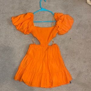Sky to Moon Boutique puffed sleeve orange sundress with side cutouts